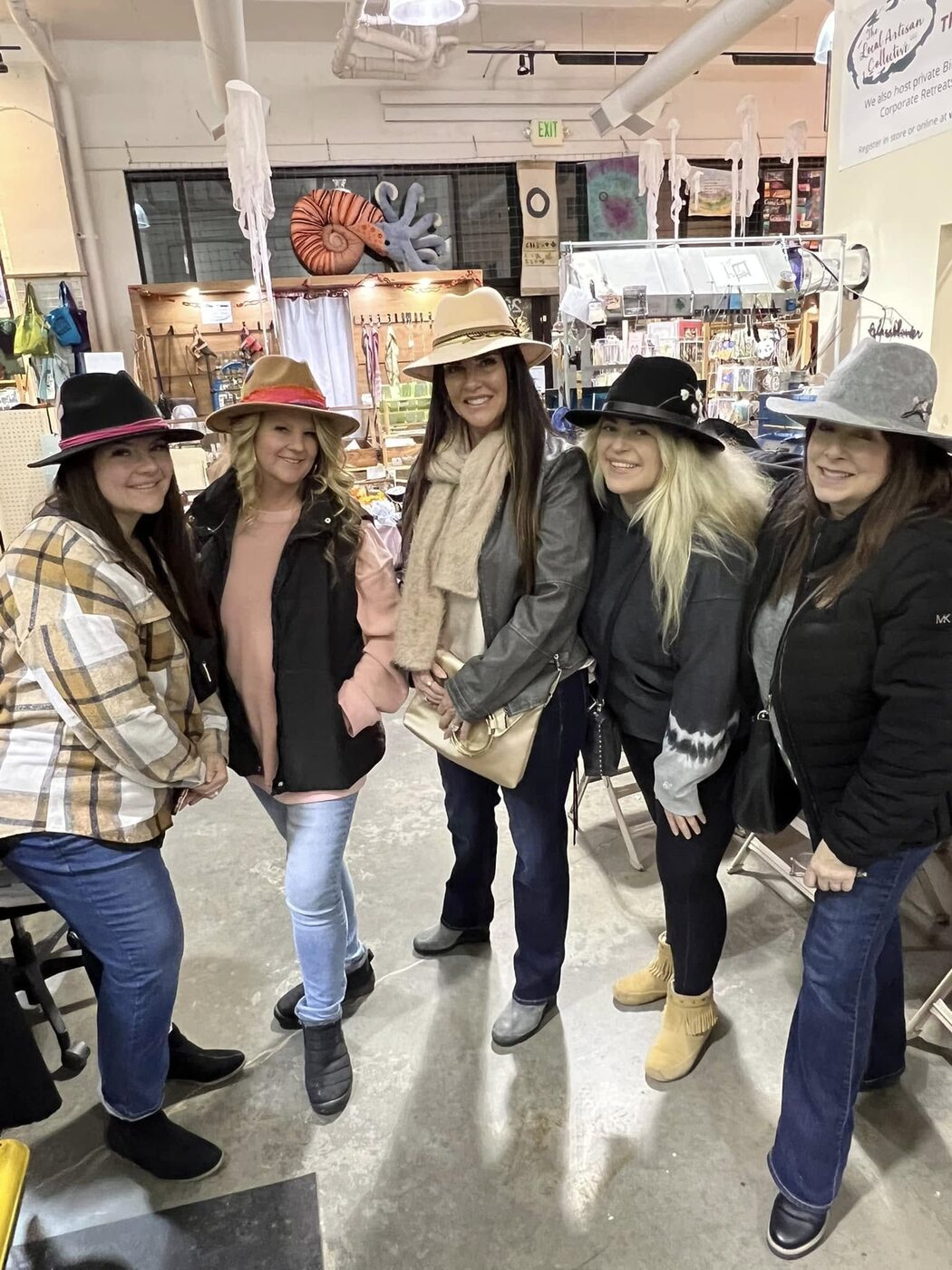 Friends in felted hats at the Collective