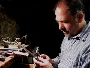 Rene Venegas at his silversmithing bench